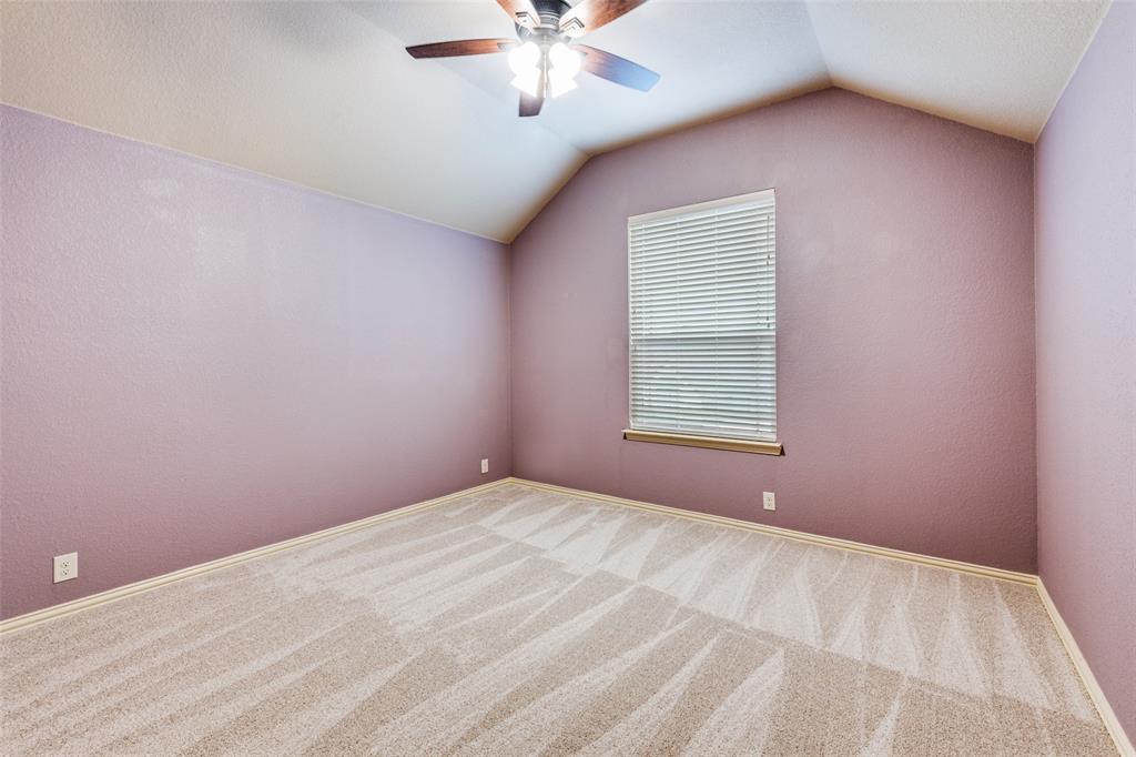 1137 Cardinal Ridge Road Burleson, TX 76028 - Photo 19 of 28 a view of a big room with a chandelier fan and windows