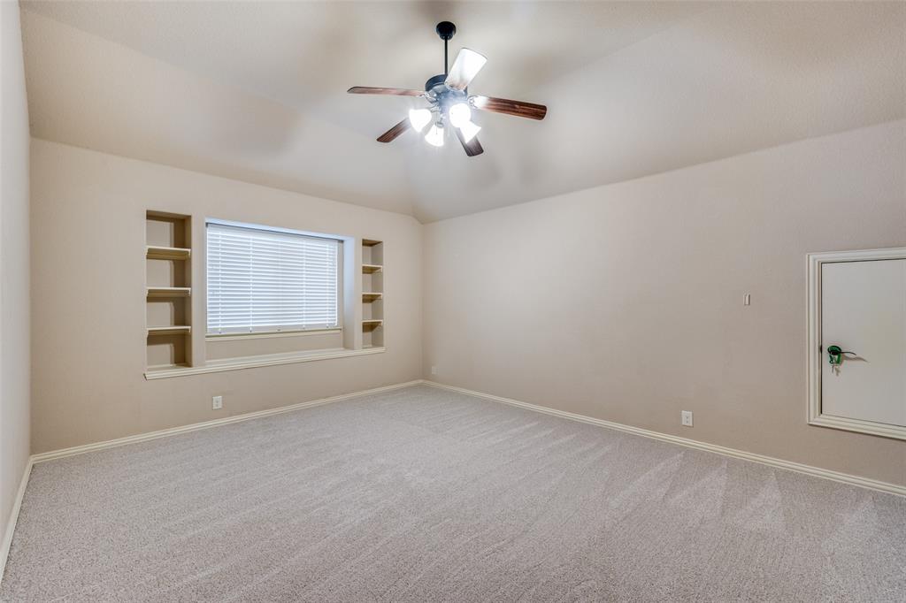 1137 Cardinal Ridge Road Burleson, TX 76028 - Photo 25 of 28 a view of an empty room with a window