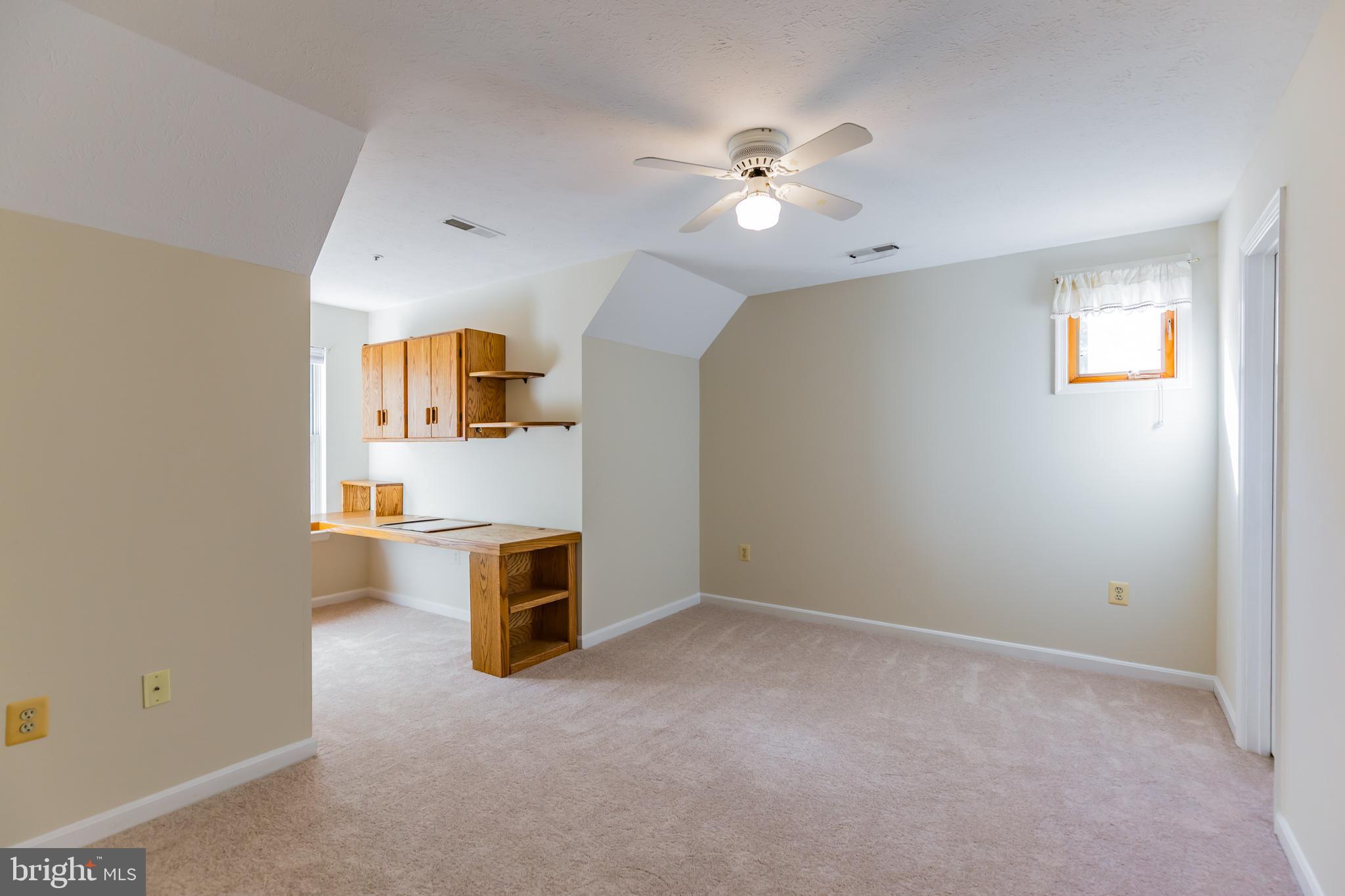 640 Small Reward Road Huntingtown, MD 20639 - Photo 12 of 28 a view of a livingroom with a staircase
