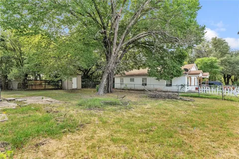 a picture of a bathroom with a shower