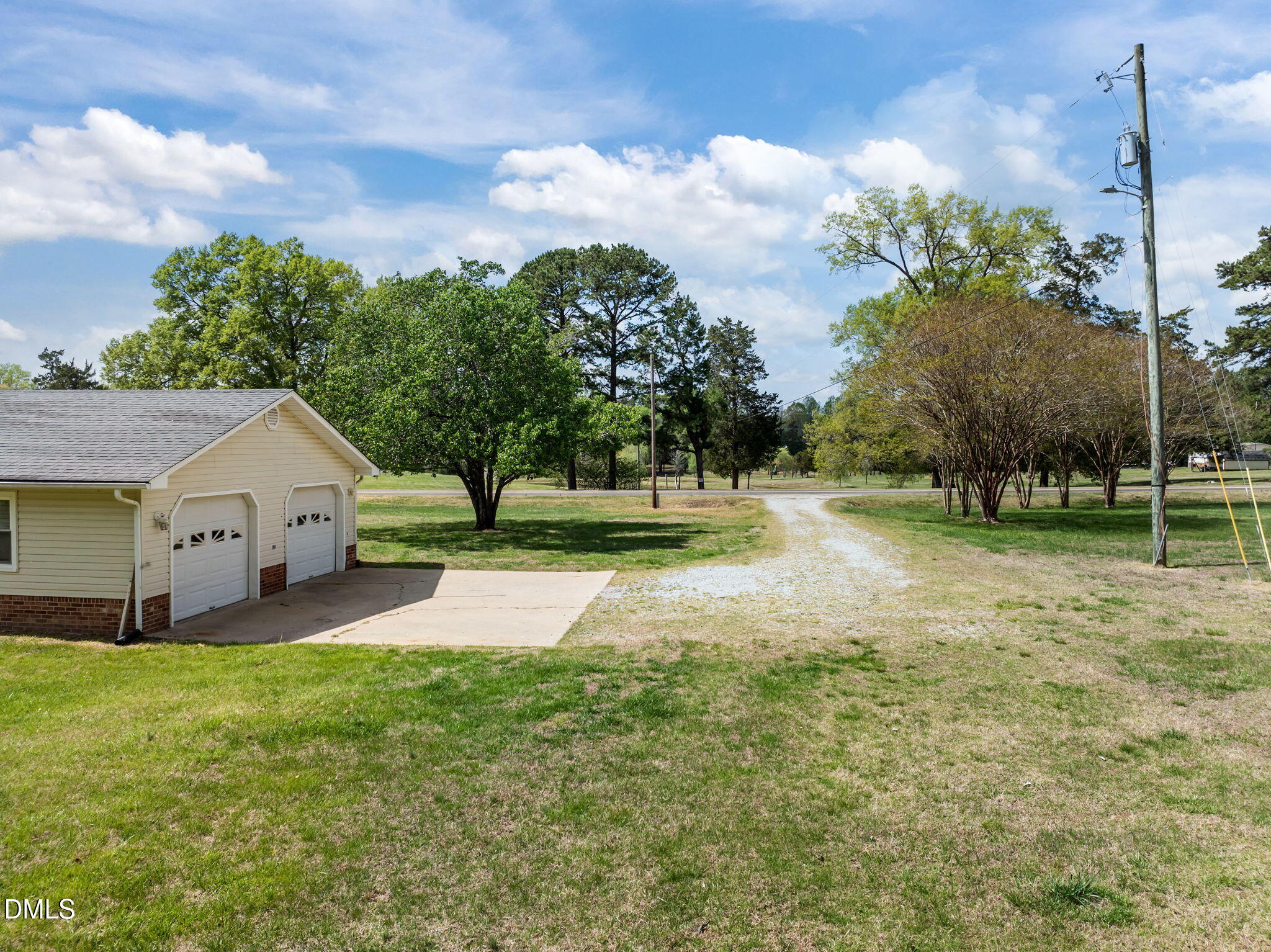 95 Harold Gill Road Roxboro, NC 27574 - Photo 35 of 53 a pathway of a house with a yard