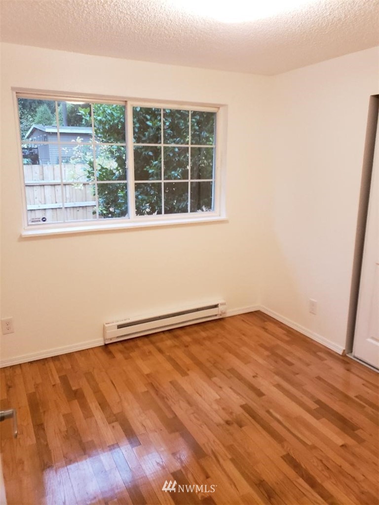 217 228th Street Southeast Bothell, WA 98021 - Photo 19 of 20 a view of an empty room with a window