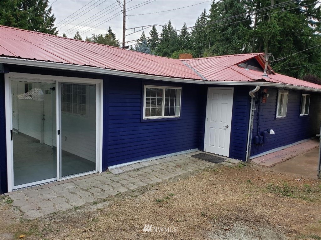 217 228th Street Southeast Bothell, WA 98021 - Photo 3 of 20 a view of a house with a yard