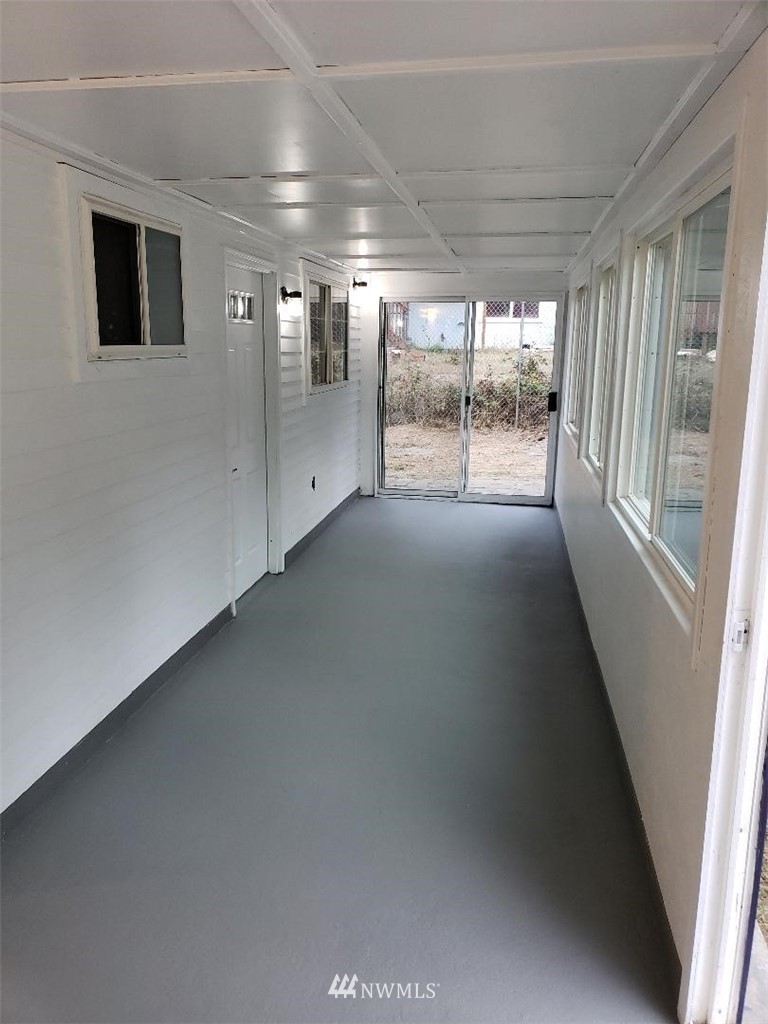 217 228th Street Southeast Bothell, WA 98021 - Photo 5 of 20 a view of hallway with an empty room