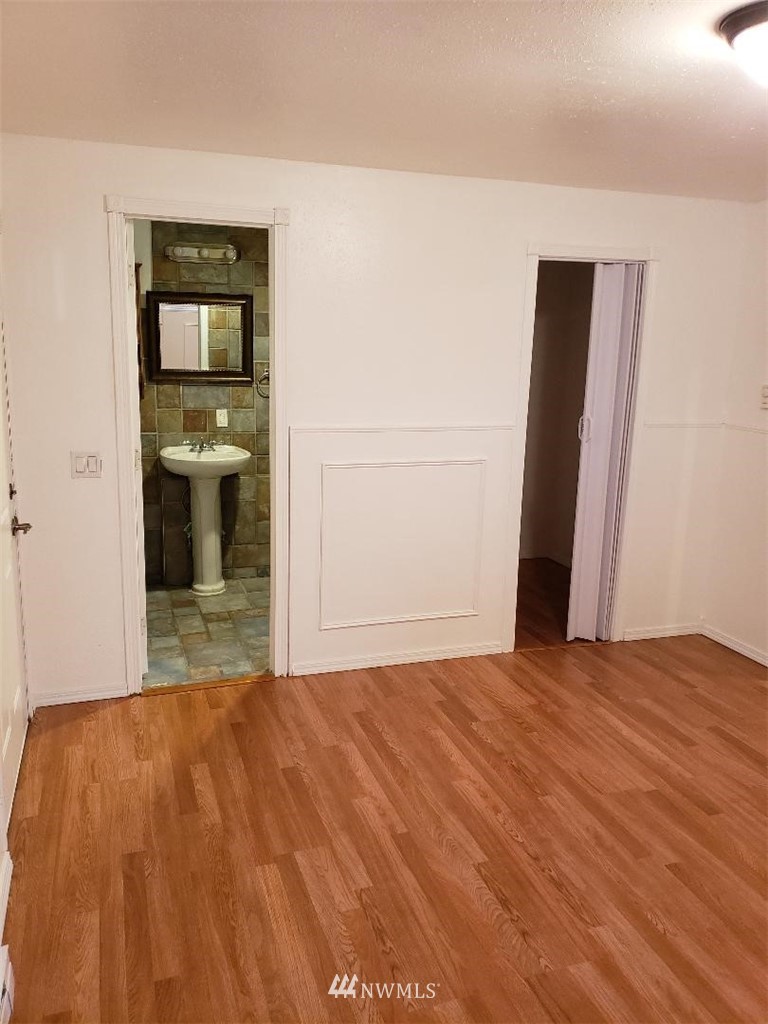 217 228th Street Southeast Bothell, WA 98021 - Photo 10 of 20 a view of an empty room with a kitchen