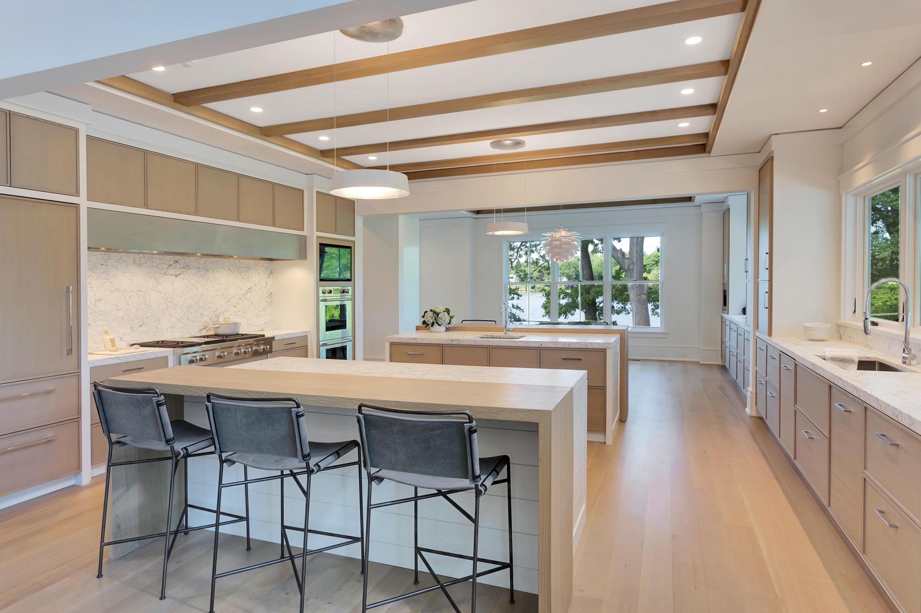 17 Brush Island Road Darien, CT 06820 - Photo 11 of 34 a kitchen with a table and chairs in it