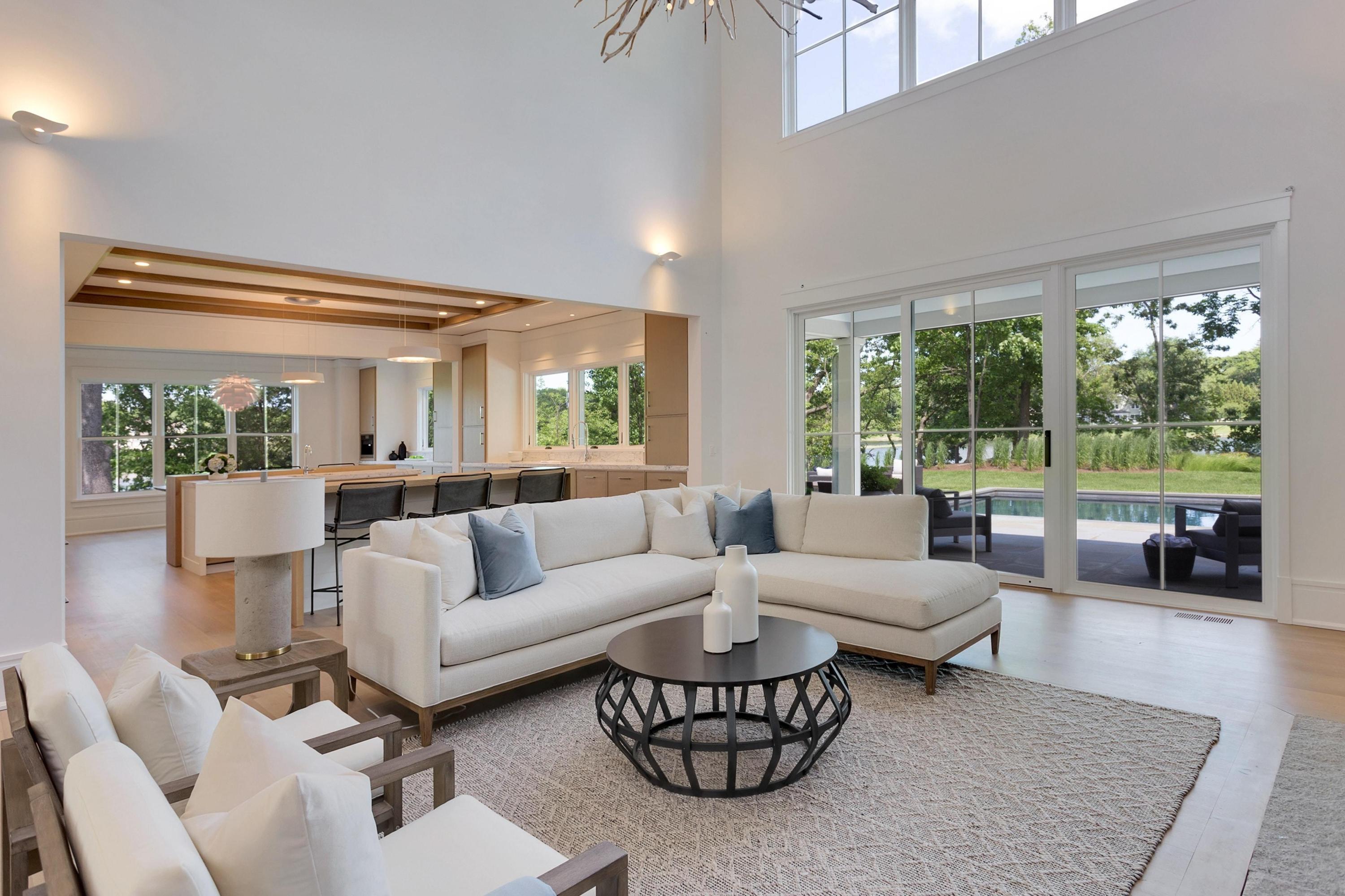 17 Brush Island Road Darien, CT 06820 - Photo 14 of 34 a living room with furniture and a large window