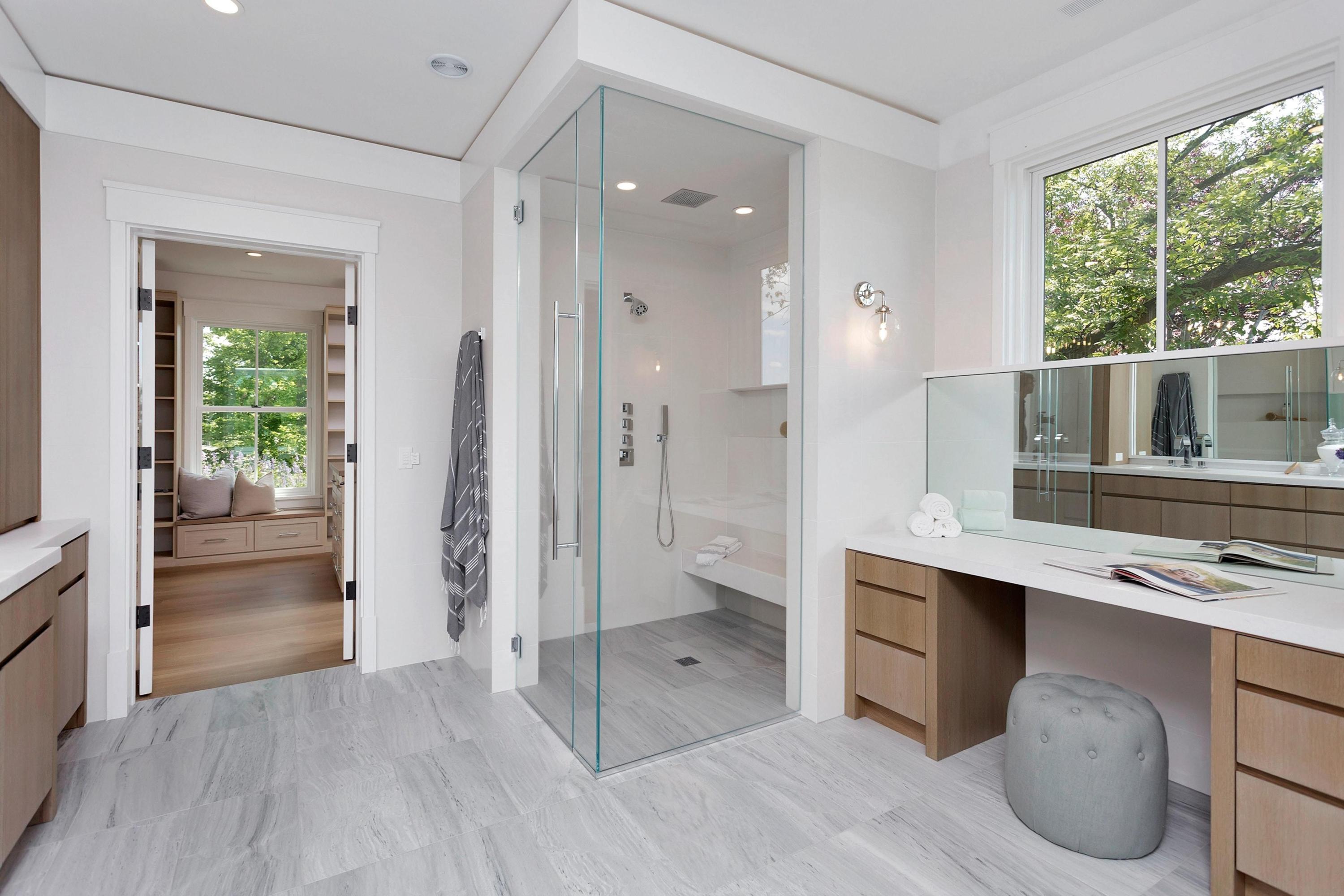 17 Brush Island Road Darien, CT 06820 - Photo 20 of 34 a bathroom with a shower sink and mirror