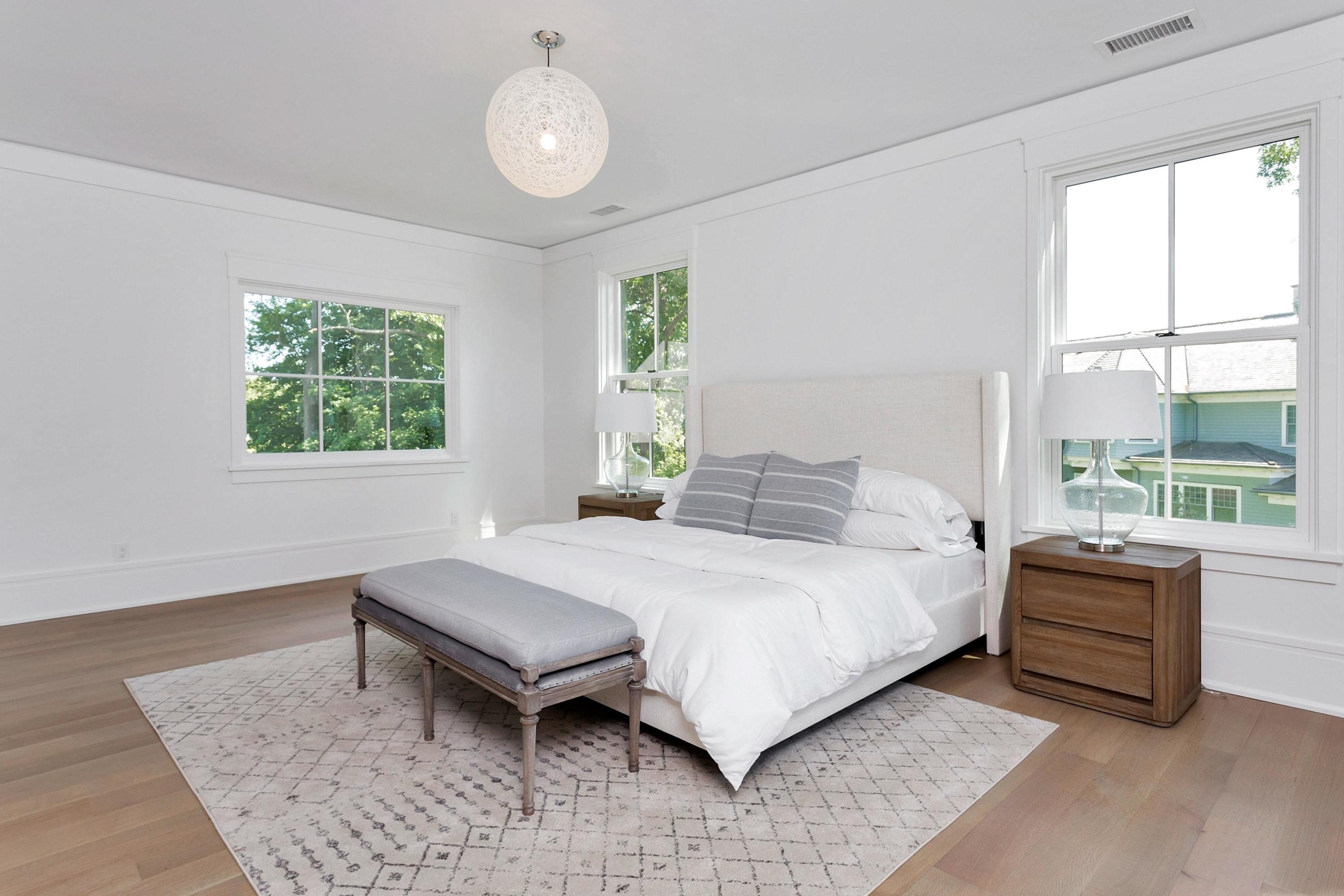 17 Brush Island Road Darien, CT 06820 - Photo 24 of 34 a bedroom with a bed and a window