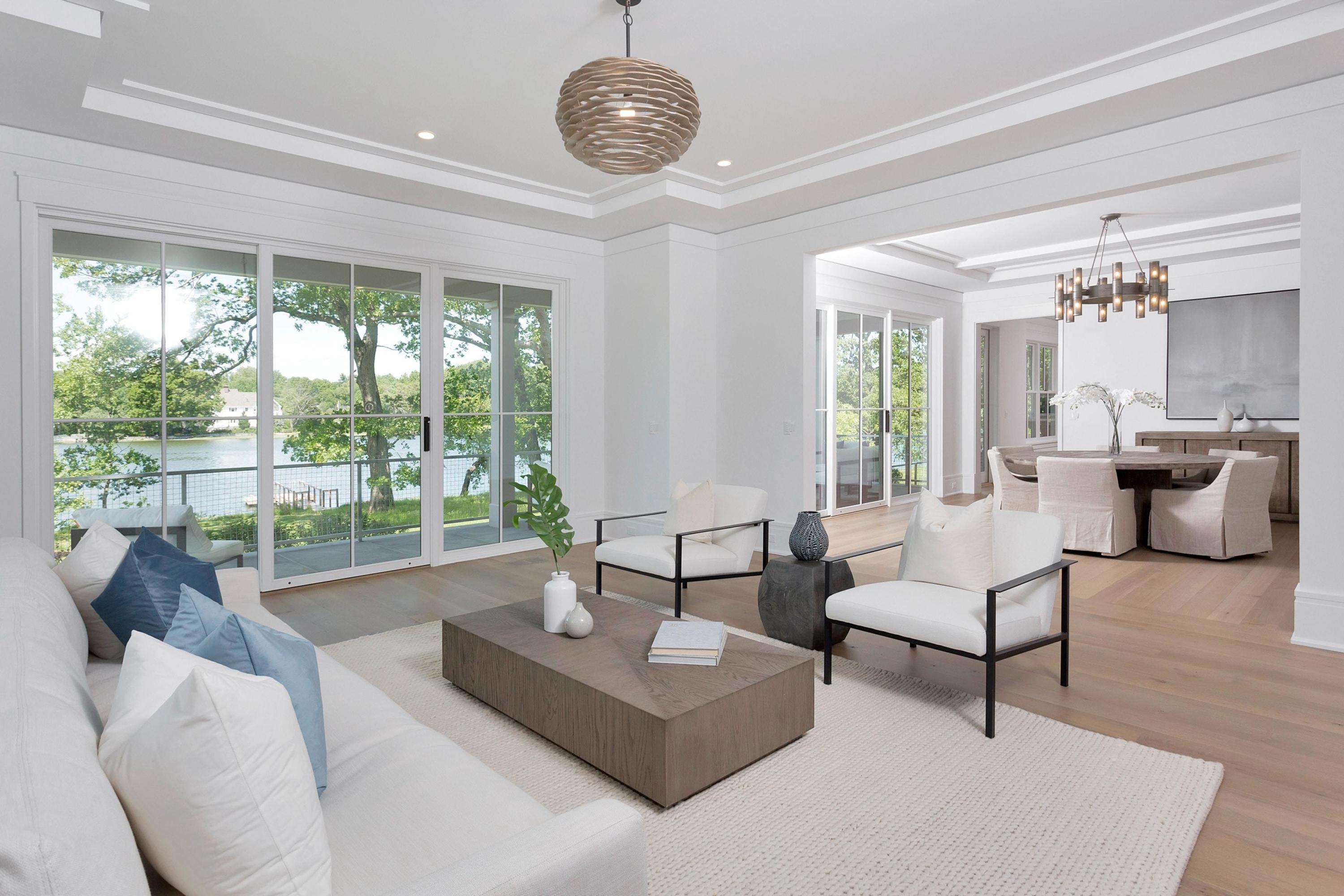 17 Brush Island Road Darien, CT 06820 - Photo 7 of 34 a living room with furniture and a large window