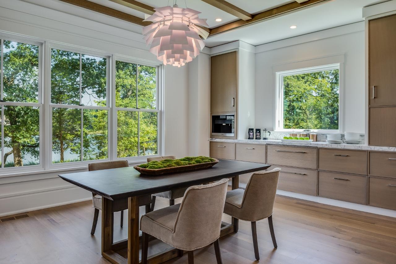 17 Brush Island Road Darien, CT 06820 - Photo 10 of 34 a dining room with furniture a chandelier and wooden floor