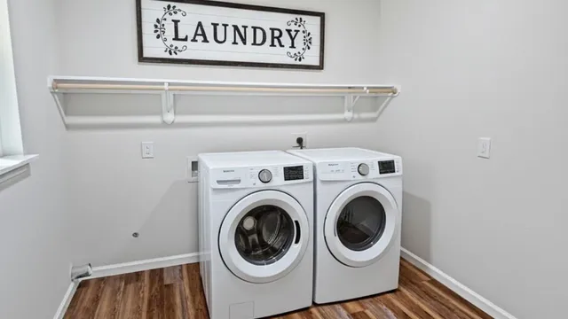 a utility room with dryer and washer