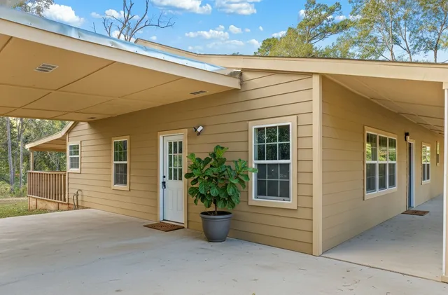 a view of house with patio