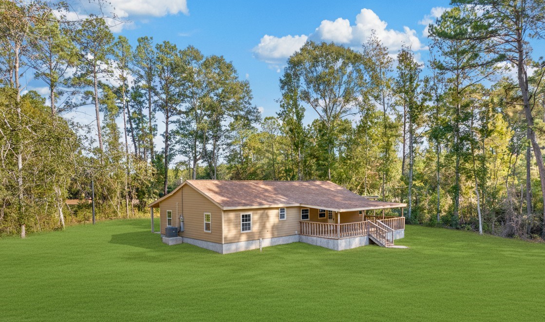 5680 Fm 252 Jasper, TX 75951 - Photo 21 of 23 a aerial view of a house with a yard
