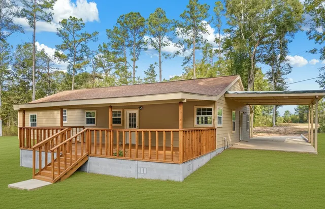 a view of a house with a roof deck