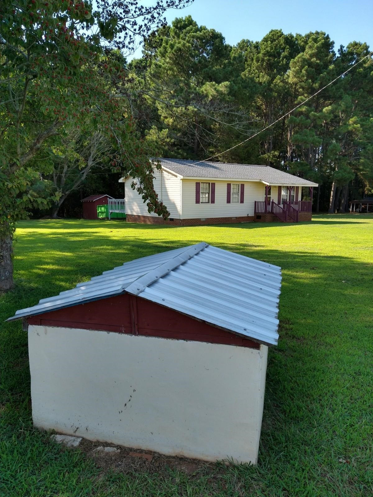 381 Friendship Church Road Middlesex, NC 27557 - Photo 2 of 19 a aerial view of a house with swimming pool and large trees