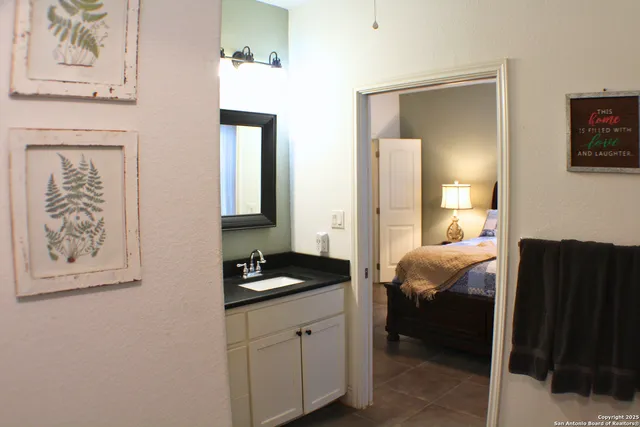 a bedroom with a bed and a closet