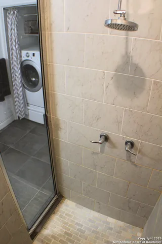 a bathroom with a sink and mirror