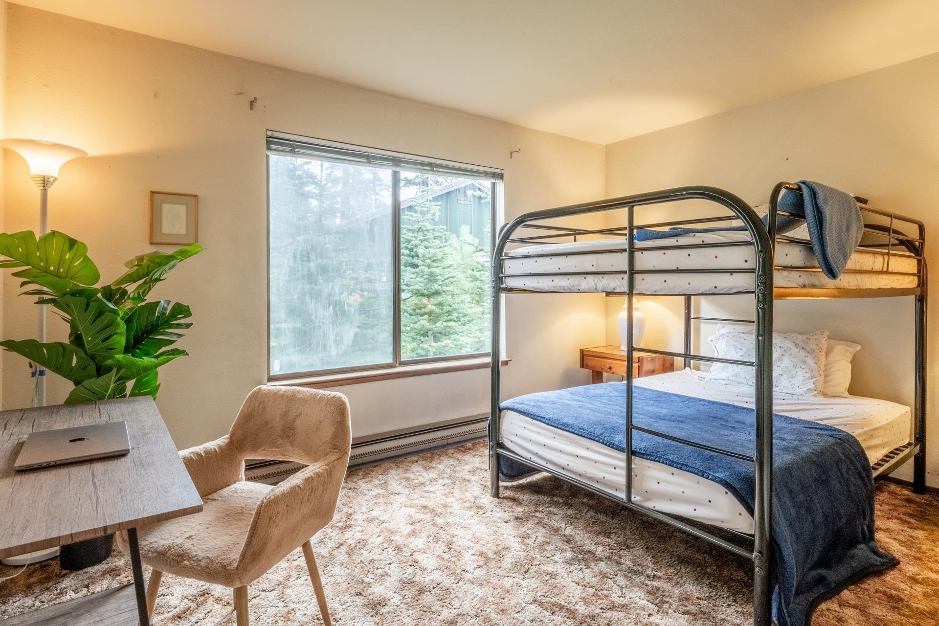 25 Lee Road, Unit 161 Mammoth Lakes, CA 93546 - Photo 19 of 43 a bedroom with a bed and a window