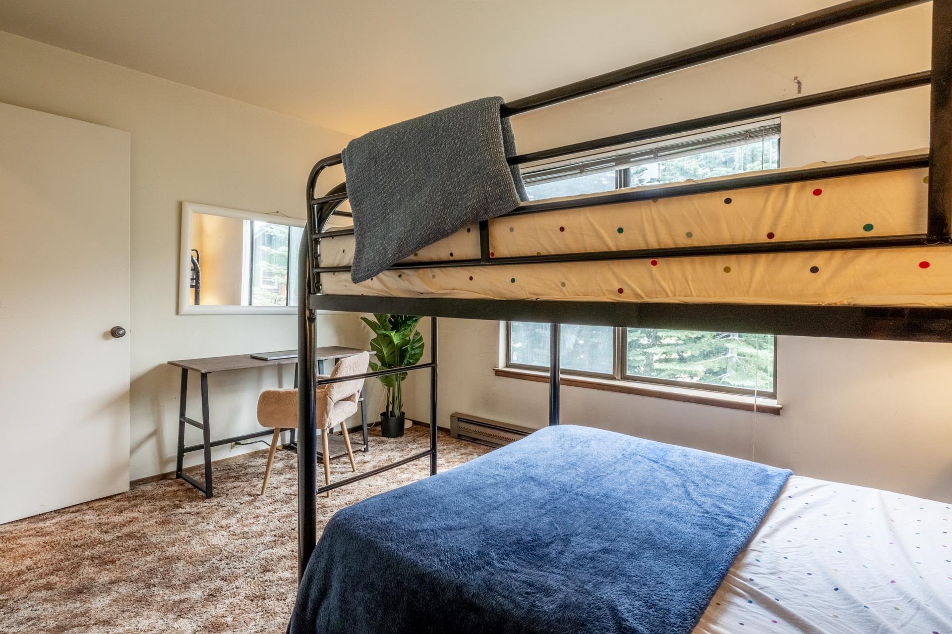 25 Lee Road, Unit 161 Mammoth Lakes, CA 93546 - Photo 20 of 43 a bedroom with a bed a desk and chair with window