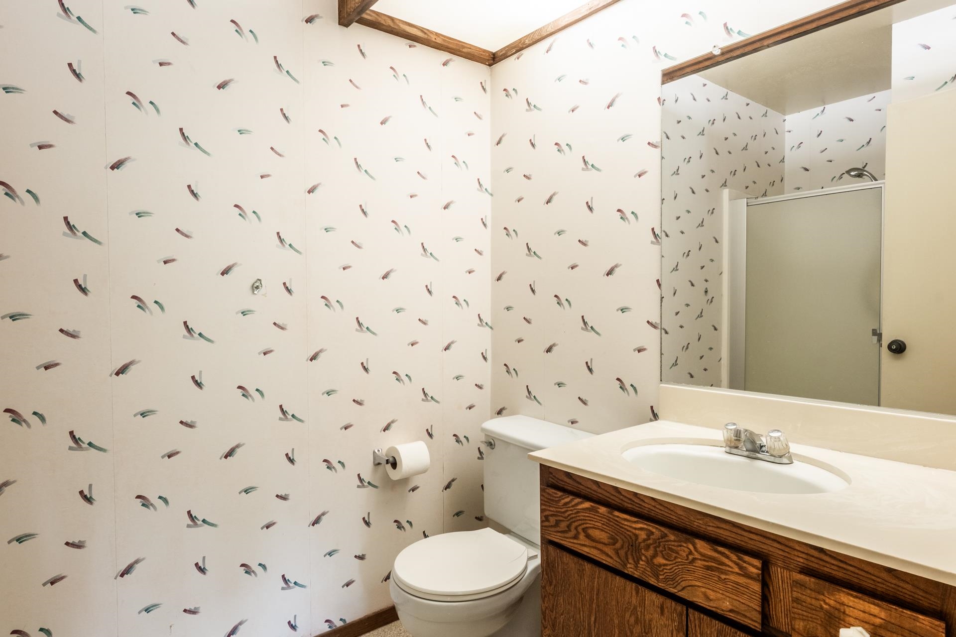 25 Lee Road, Unit 161 Mammoth Lakes, CA 93546 - Photo 28 of 43 a bathroom with a granite countertop toilet sink and mirror