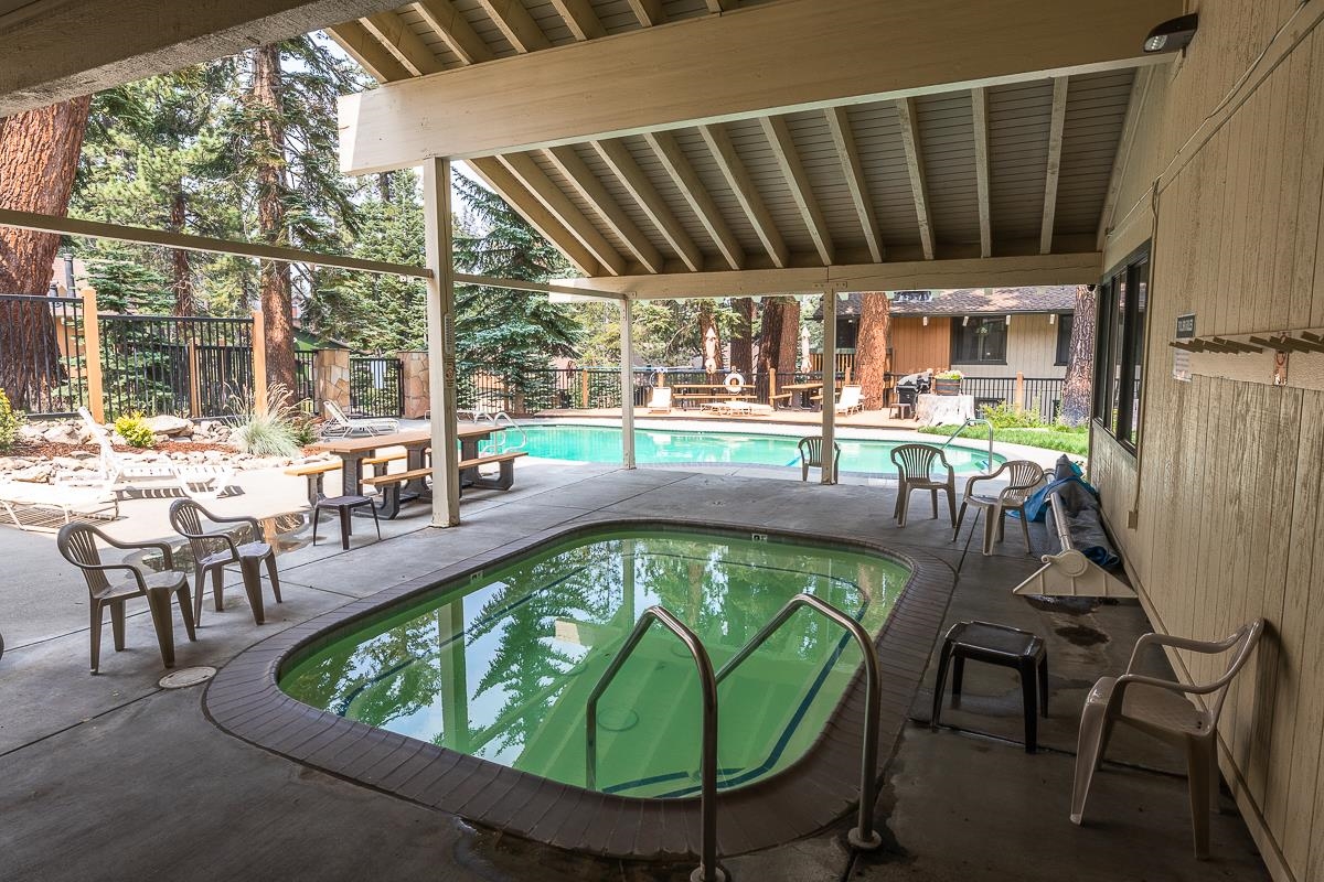 25 Lee Road, Unit 161 Mammoth Lakes, CA 93546 - Photo 37 of 43 a dining room with furniture and a large window
