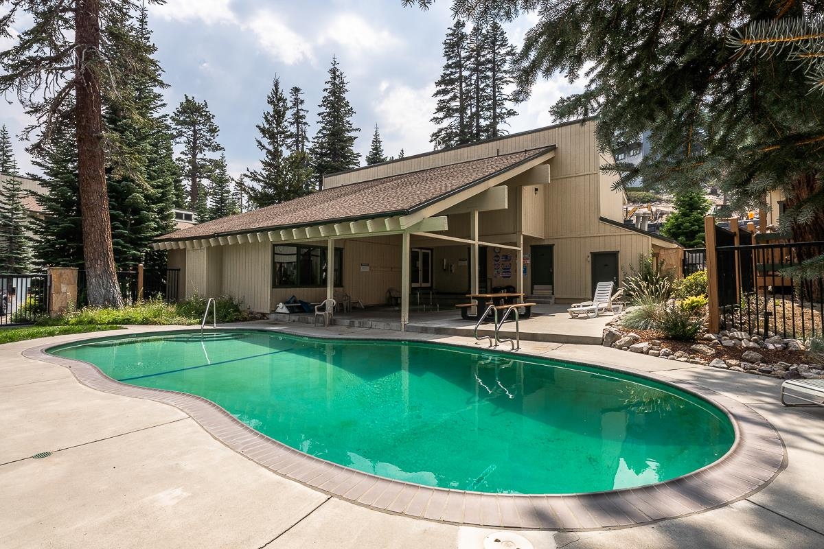 25 Lee Road, Unit 161 Mammoth Lakes, CA 93546 - Photo 39 of 43 a view of a house with swimming pool and sitting area