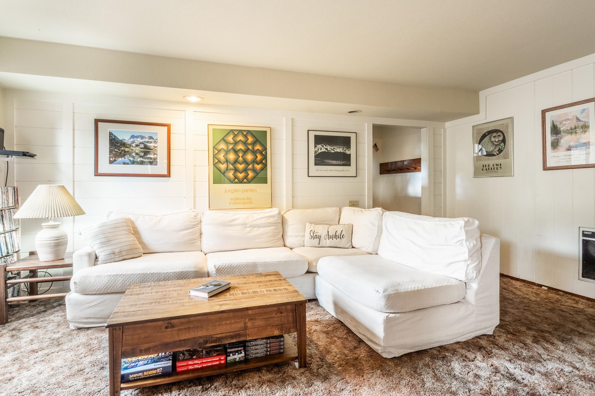 25 Lee Road, Unit 161 Mammoth Lakes, CA 93546 - Photo 6 of 43 a living room with furniture and a wall painting