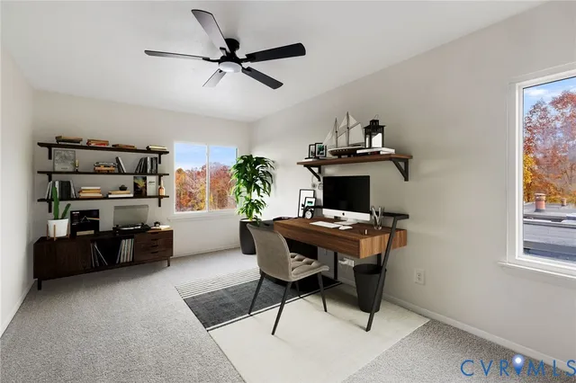 a workspace with furniture and window