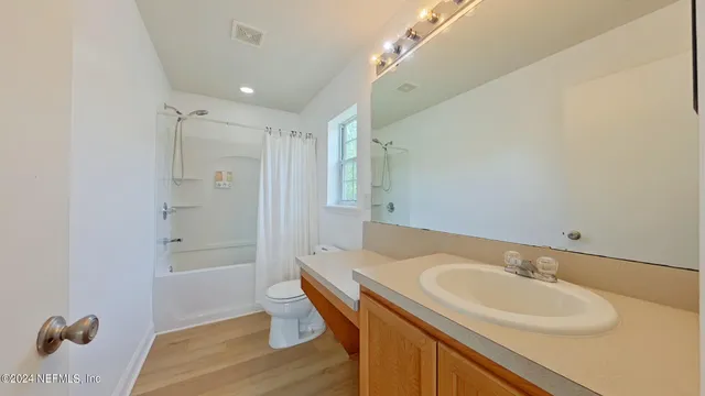 a view of a backyard with furniture