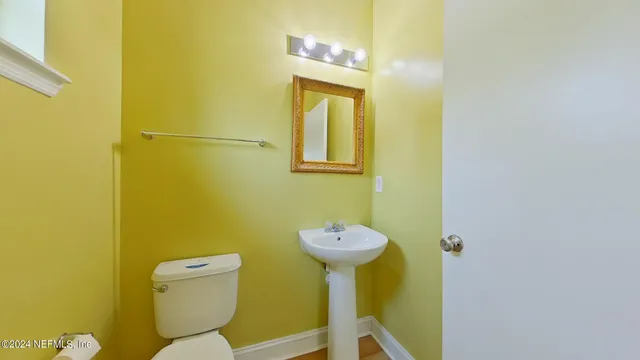 a bathroom with a sink and a toilet