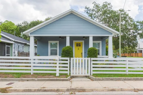 a front view of a house with a porch