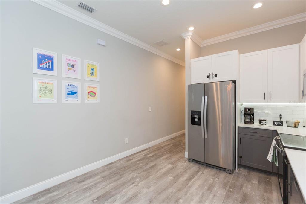 2901 N Boulevard Tampa, FL 33602 - Photo 15 of 63 a kitchen with stainless steel appliances a refrigerator and a stove top oven