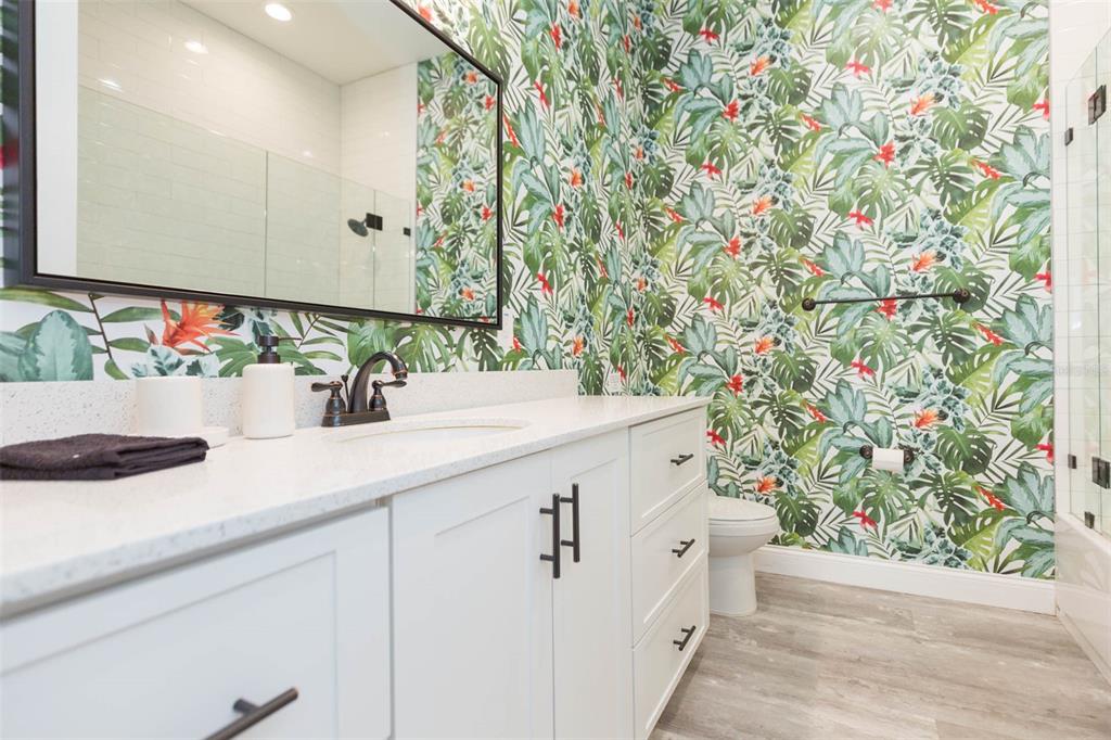 2901 N Boulevard Tampa, FL 33602 - Photo 32 of 63 a bathroom with a sink and mirror