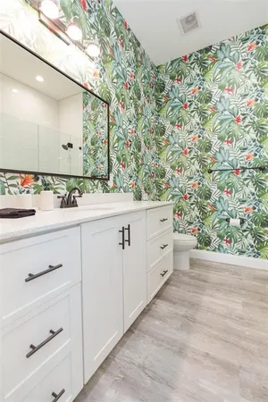 a bathroom with a sink and a toilet