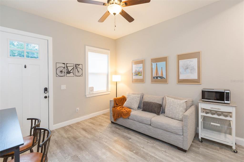 2901 N Boulevard Tampa, FL 33602 - Photo 53 of 63 a living room with furniture and a flat screen tv