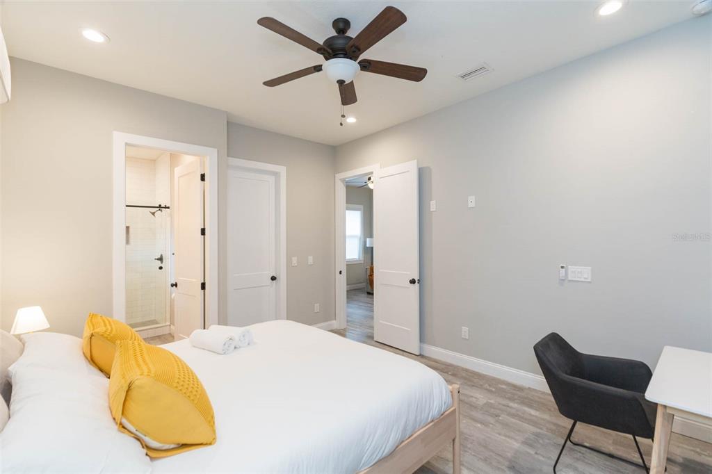 2901 N Boulevard Tampa, FL 33602 - Photo 59 of 63 a bedroom with a bed and a chair