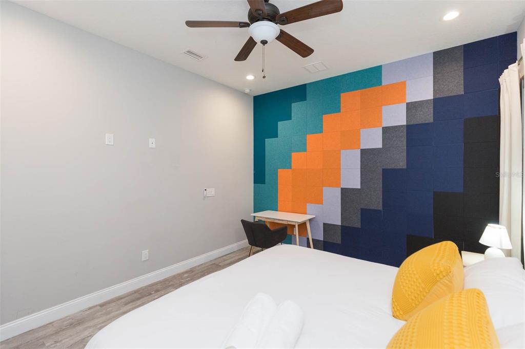 2901 N Boulevard Tampa, FL 33602 - Photo 60 of 63 a bed room with a bed and chandelier