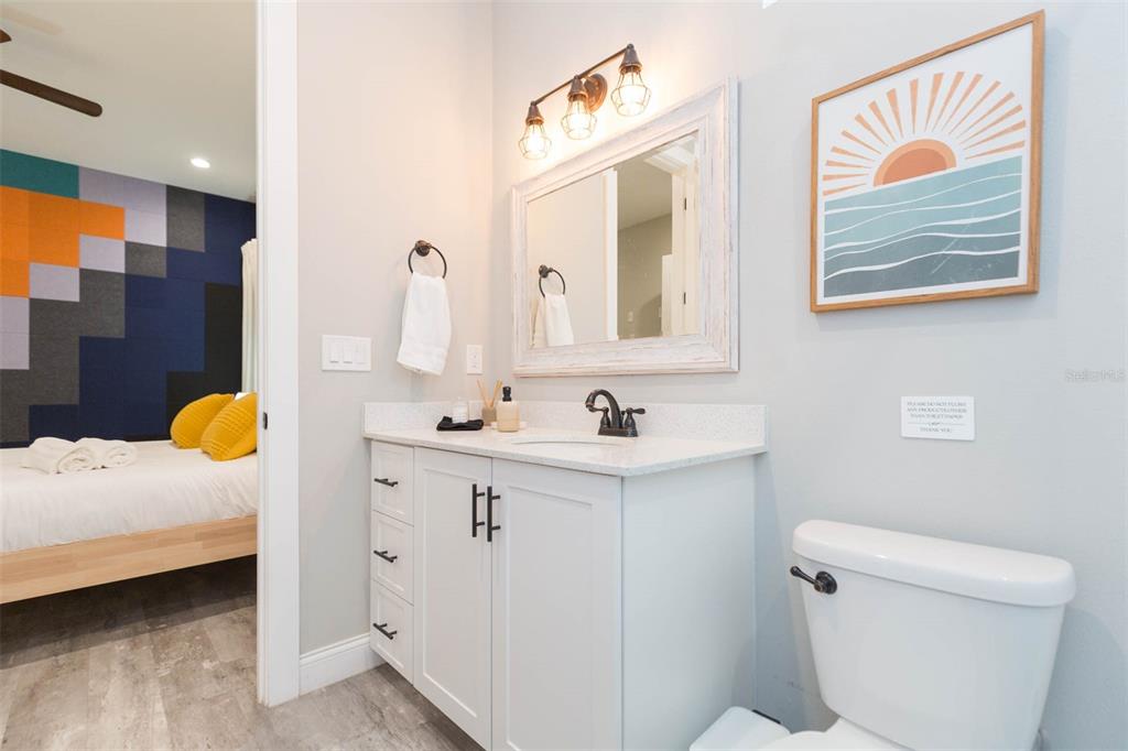 2901 N Boulevard Tampa, FL 33602 - Photo 63 of 63 a bathroom with a sink mirror vanity and toilet