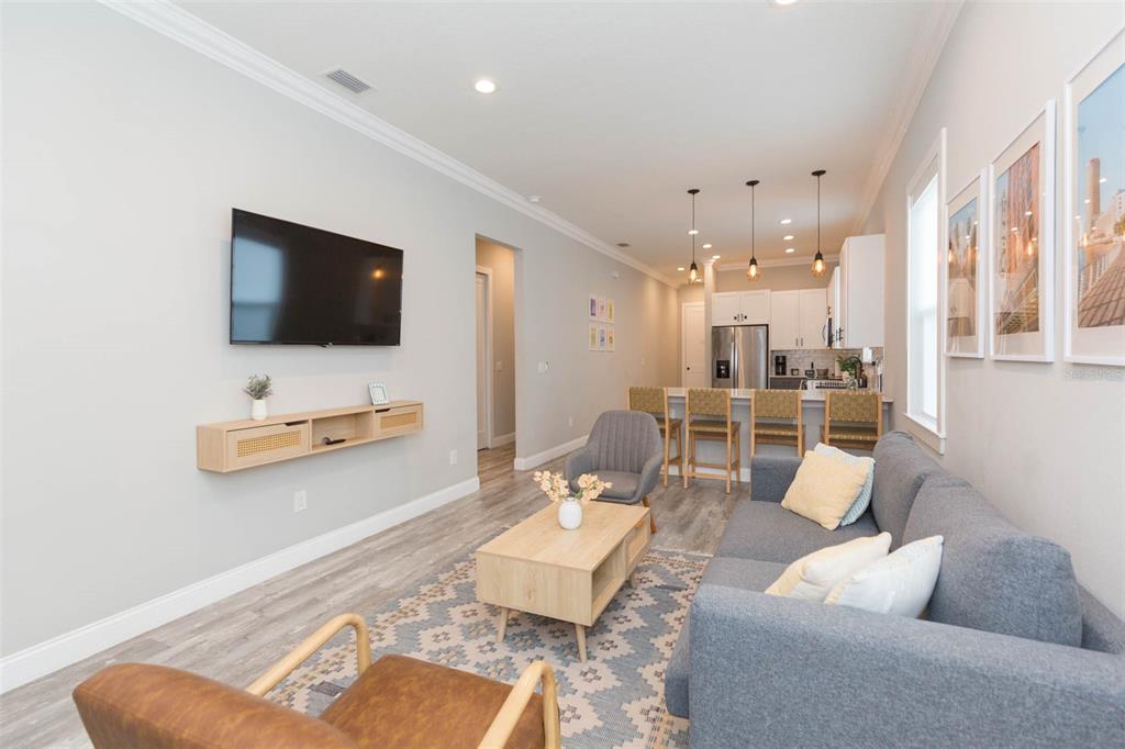 2901 N Boulevard Tampa, FL 33602 - Photo 10 of 63 a living room with furniture and a flat screen tv