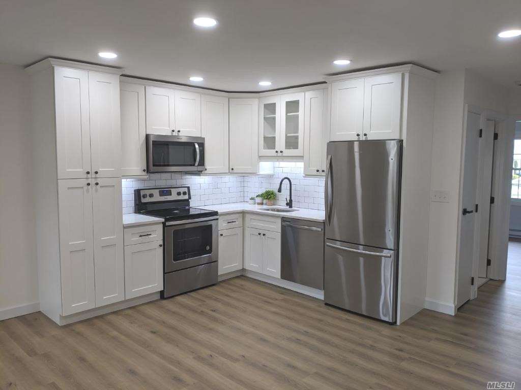 166 Ventry Court, Unit D Ridge, NY 11961 - Photo 1 of 13 NEW Kitchen