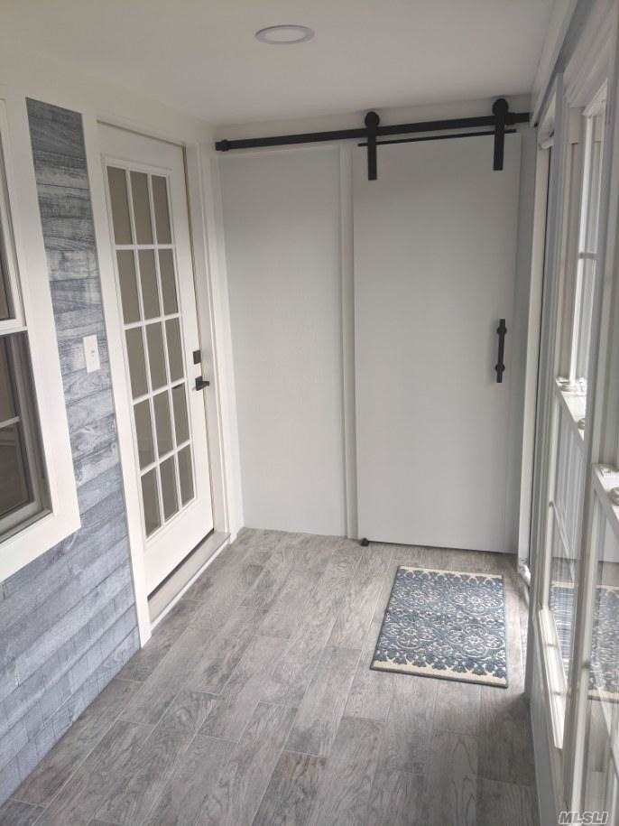 166 Ventry Court, Unit D Ridge, NY 11961 - Photo 2 of 13 Enclosed Patio
