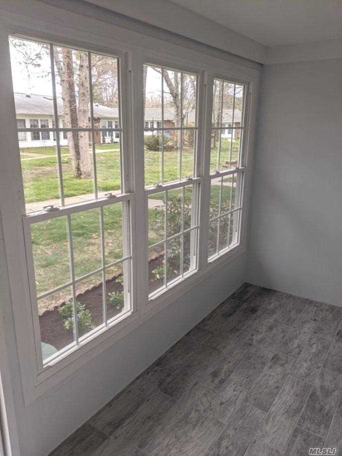 166 Ventry Court, Unit D Ridge, NY 11961 - Photo 3 of 13 Windows In Patio Area