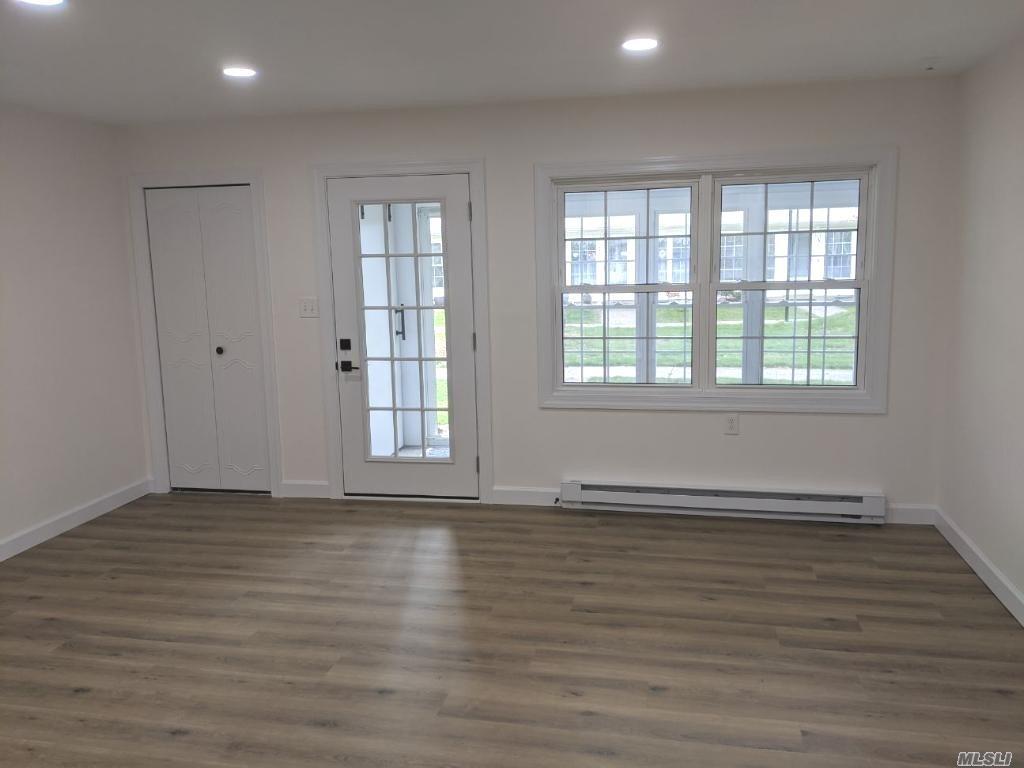 166 Ventry Court, Unit D Ridge, NY 11961 - Photo 4 of 13 Living Room