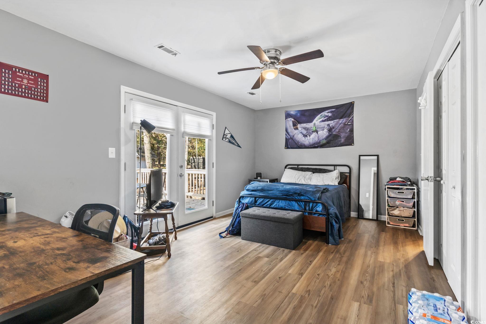109 Clemson Road Conway, SC 29526 - Photo 6 of 25 Bedroom with hardwood / wood-style floors, access