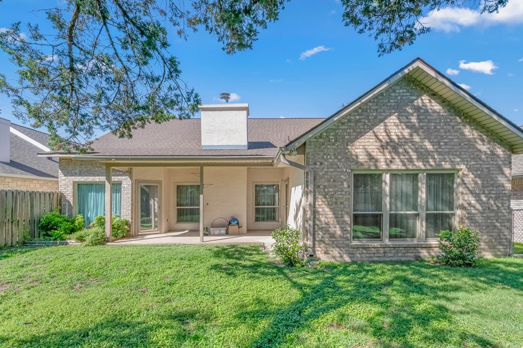 225 Los Cedros Loop Kerrville, TX 78028 - Photo 22 of 27 a view of a house with a yard