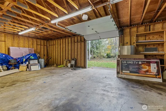 a view of a room with wooden walls