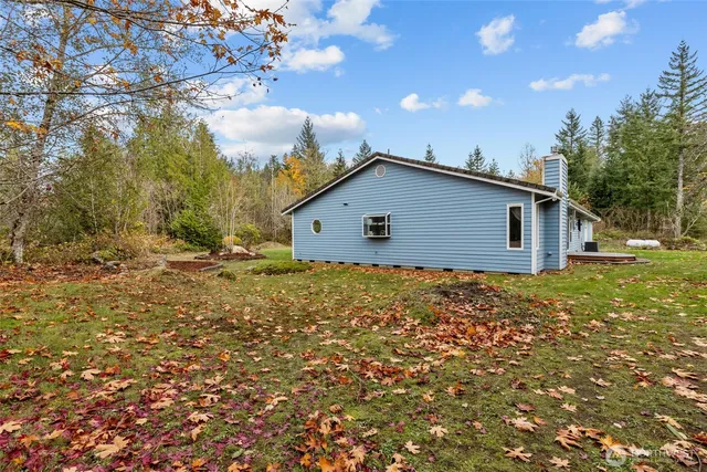 a house with a tree in front of it