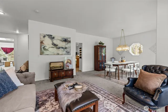 a living room with furniture and a table