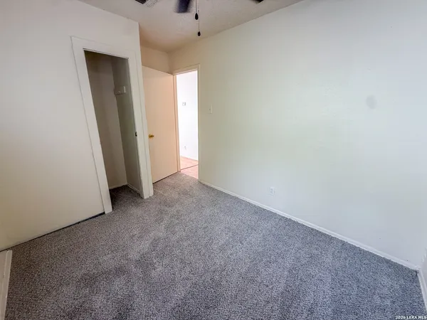 an empty room with closet
